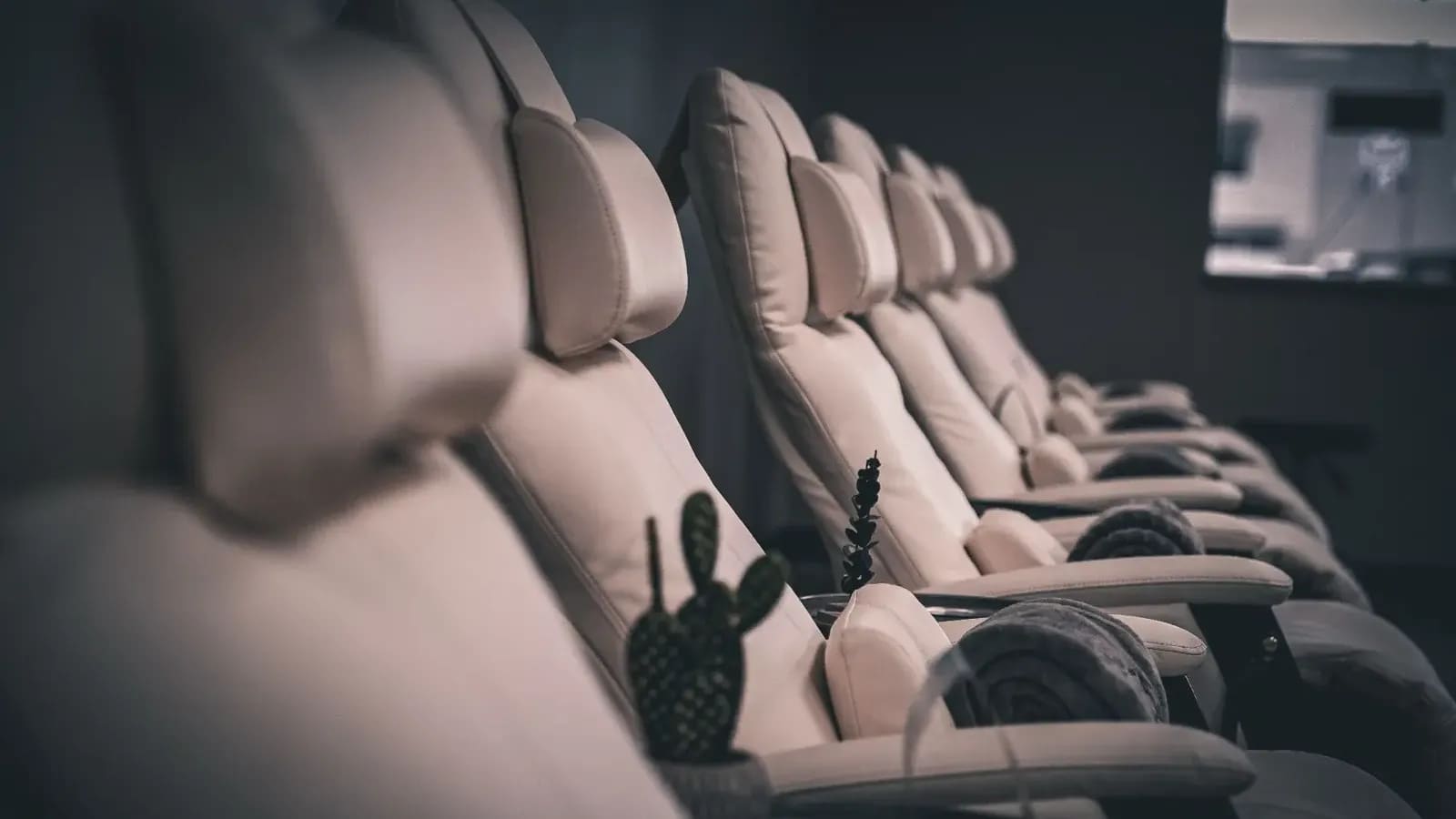 Close-up of the white reclining infusion chairs at Alpha IV Therapy